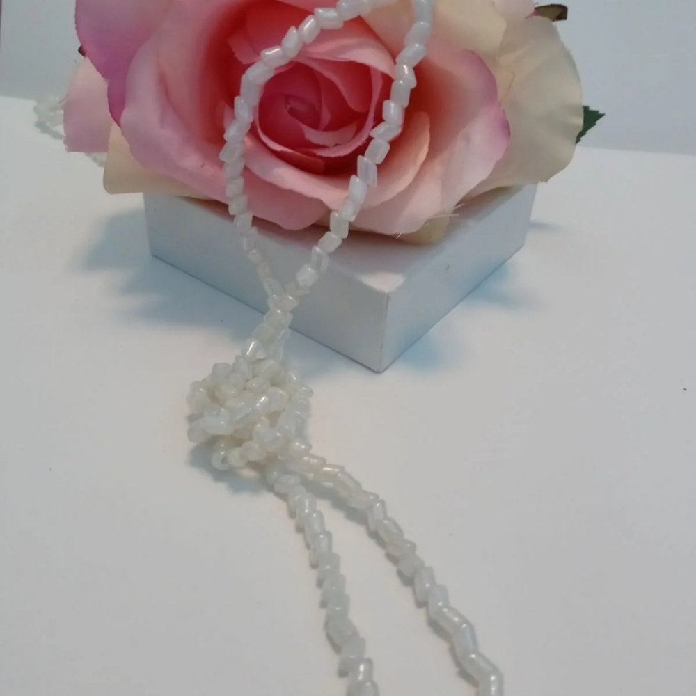 This hand made vintage white Caribbean coral ha e